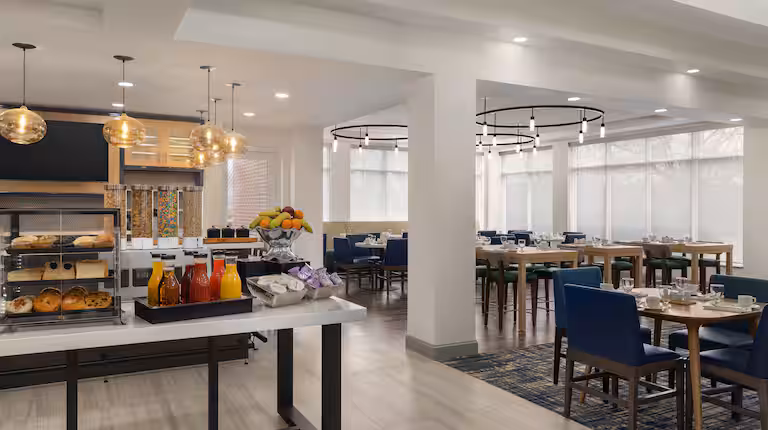 Hotel breakfast and dining area with buffet